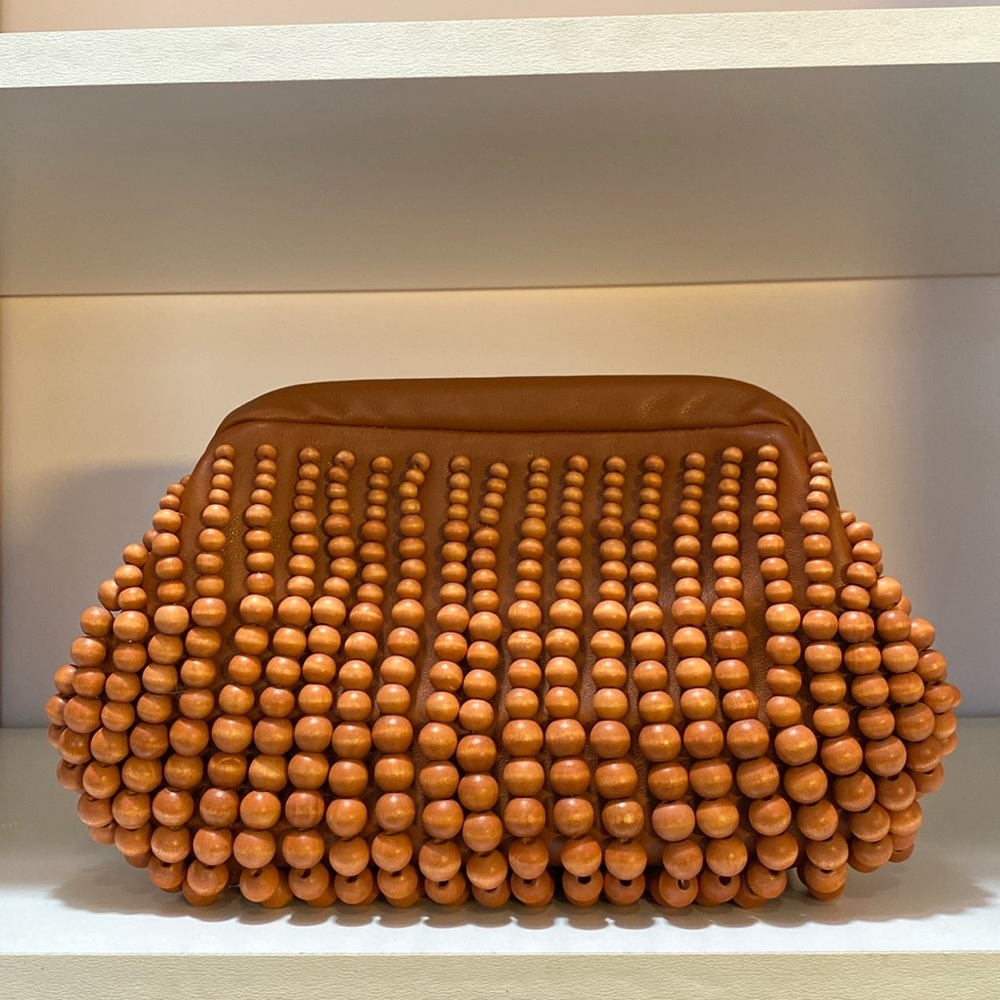 Urban Expressions wooden beaded clutch with removable strap